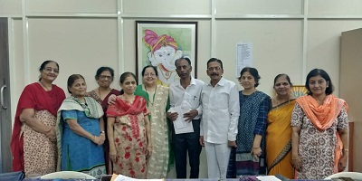 Handing over the cheque